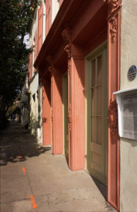 pink door frames at the ancrum wharf building in charleston, south carolina, photographed by jamie bannon photography.