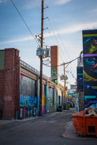 colorful alley full of street art in denver, colorado, photographed by jamie bannon photography.