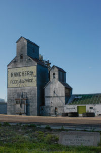 an abandoned grain elevator in lusk, wyoming, photographed by jamie bannon photography.