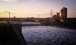 sunset over the mississippi river, photographed by jamie bannon photography.