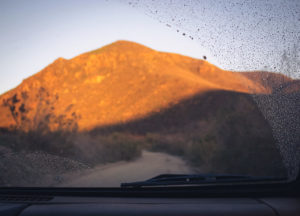 sunset on the road to the rancho san carlos hot springs in baja california, mexico, photographed by jamie bannon photography.