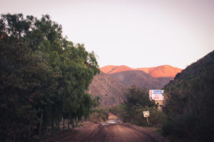 sunset on the road to the rancho san carlos hot springs in baja california, mexico, photographed by jamie bannon photography.