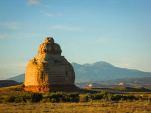 a spherical rock formation somewhere in utah, photographed by jamie bannon photography.