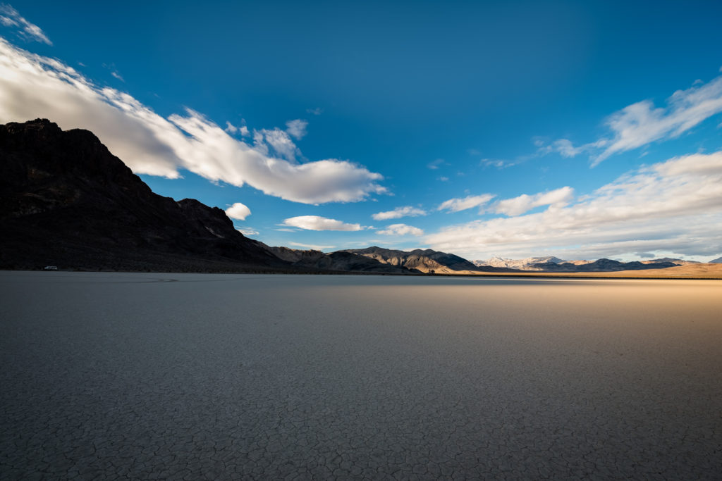 sunset over the racetrack playa in death valley, california, photographed by jamie bannon photography.