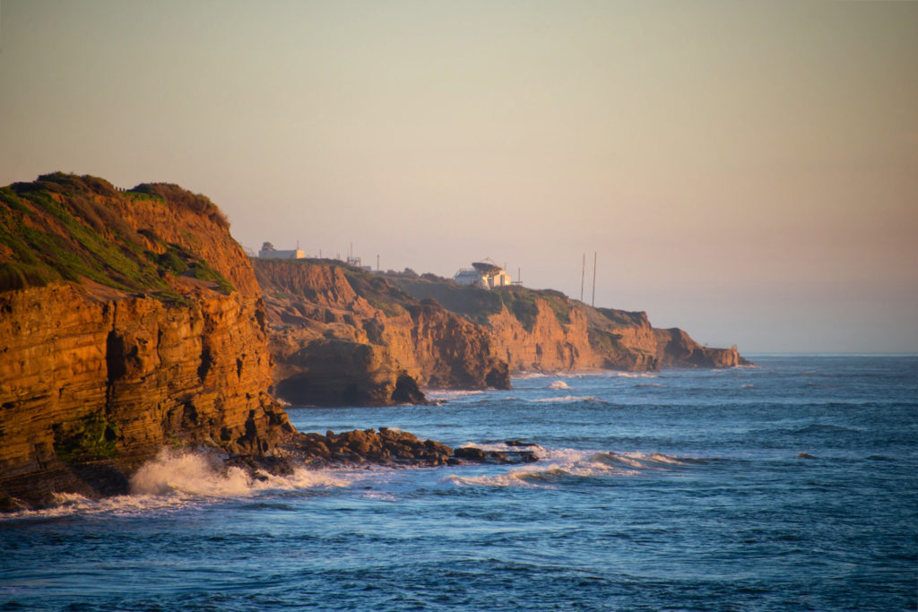 rocky bluffs at sunset at ocean beach in san diego, california, photographed by jamie bannon photography.