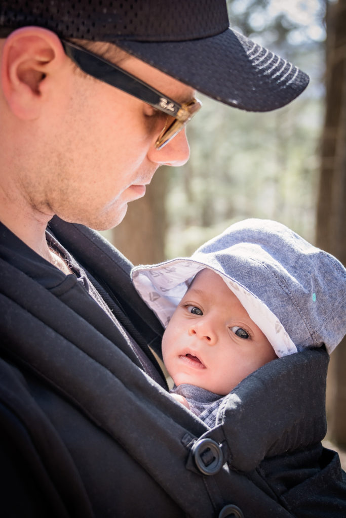 portrait of a dad and his small baby hiking at kent falls in kent, connecticut, photographed by jamie bannon photography.