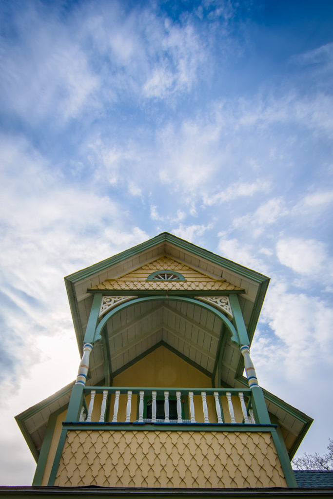 yellow and green gingerbread house on martha's vineyard, photographed by jamie bannon photography.