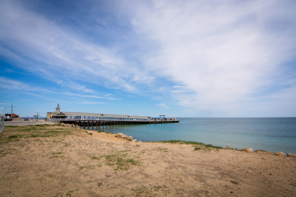 shore with jetty on martha's vineyard, photographed by jamie bannon photography.