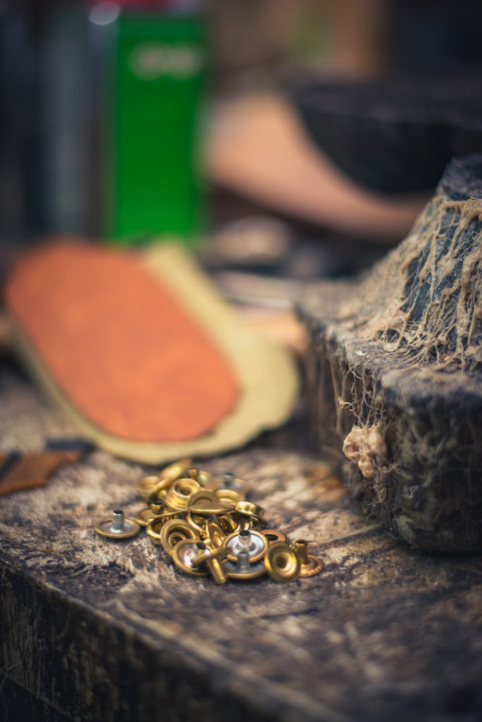 detail of rivets at a cobbler shop in unionville, connecticut, photographed by jamie bannon photography.
