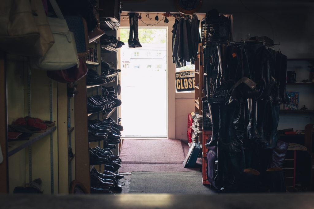 interior of a cobbler shop in unionville, connecticut, photographed by jamie bannon photography.