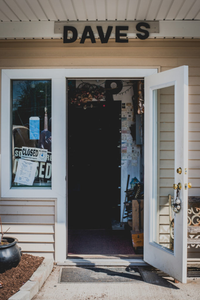 entrance door to dave's shoe repair cobbler shop in unionville, connecticut, photographed by jamie bannon photography.