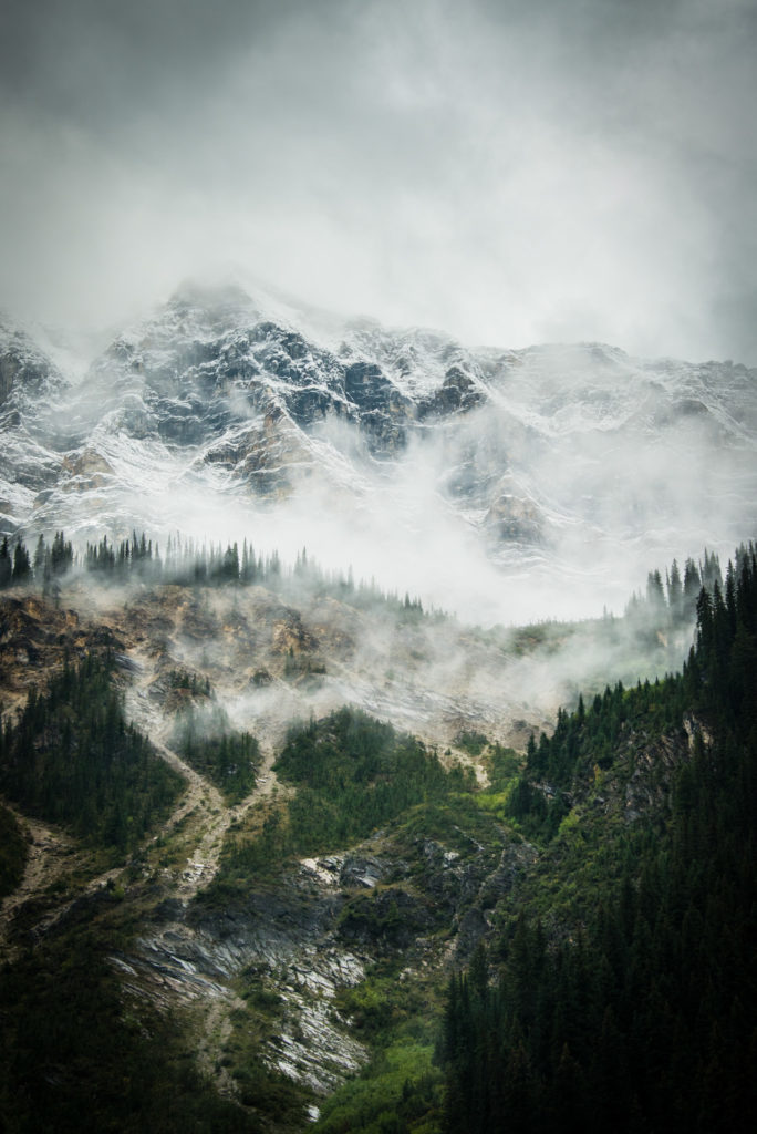 mountains in fog at yoho national park of canada in british columbia, photographed by jamie bannon photography.