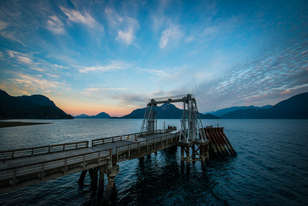 sunrise over the boat launch at porteau cove provincial park, british columbia, photographed by jamie bannon photography.