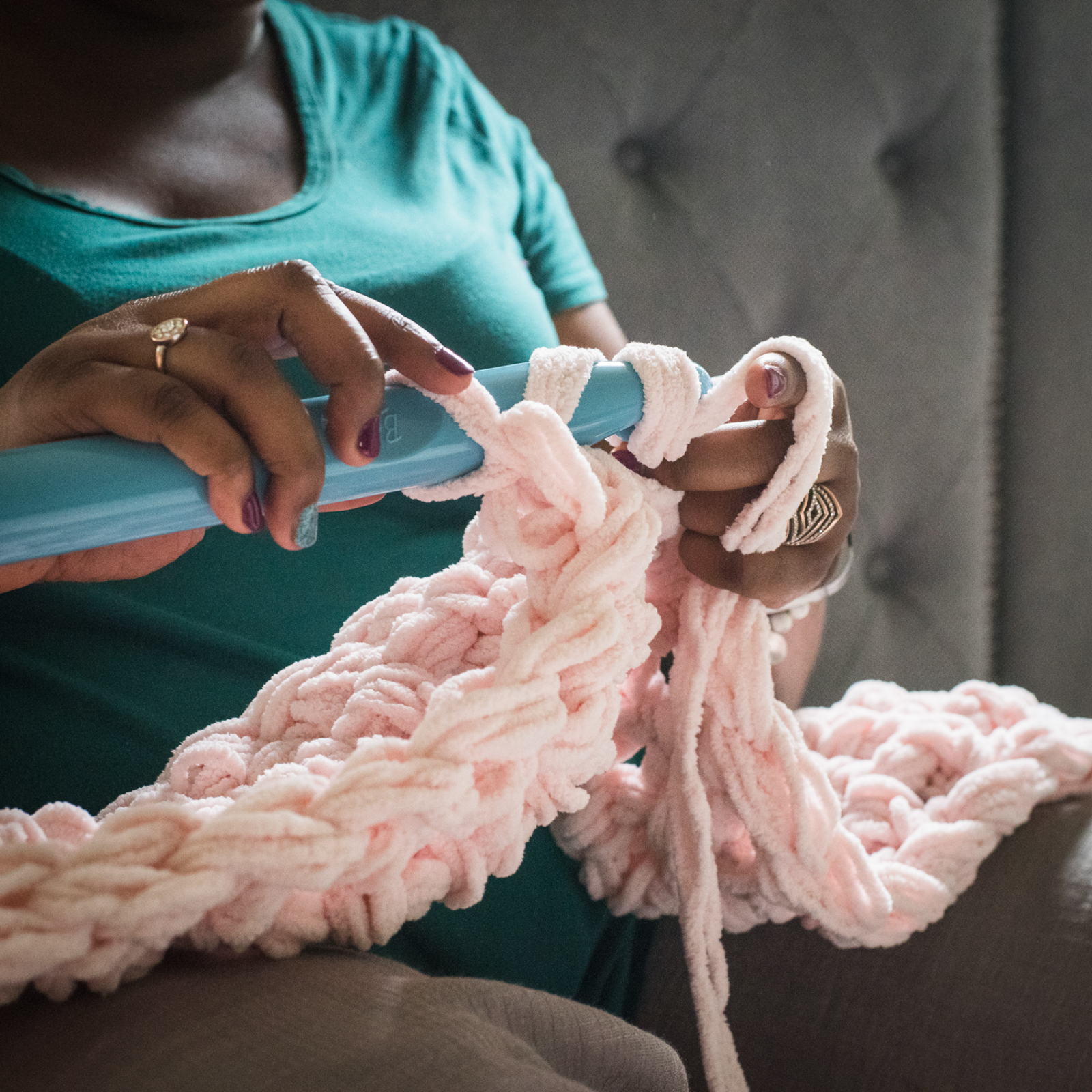 detail of a woman crocheting, photographed as part of a brand shoot by jamie bannon photography.