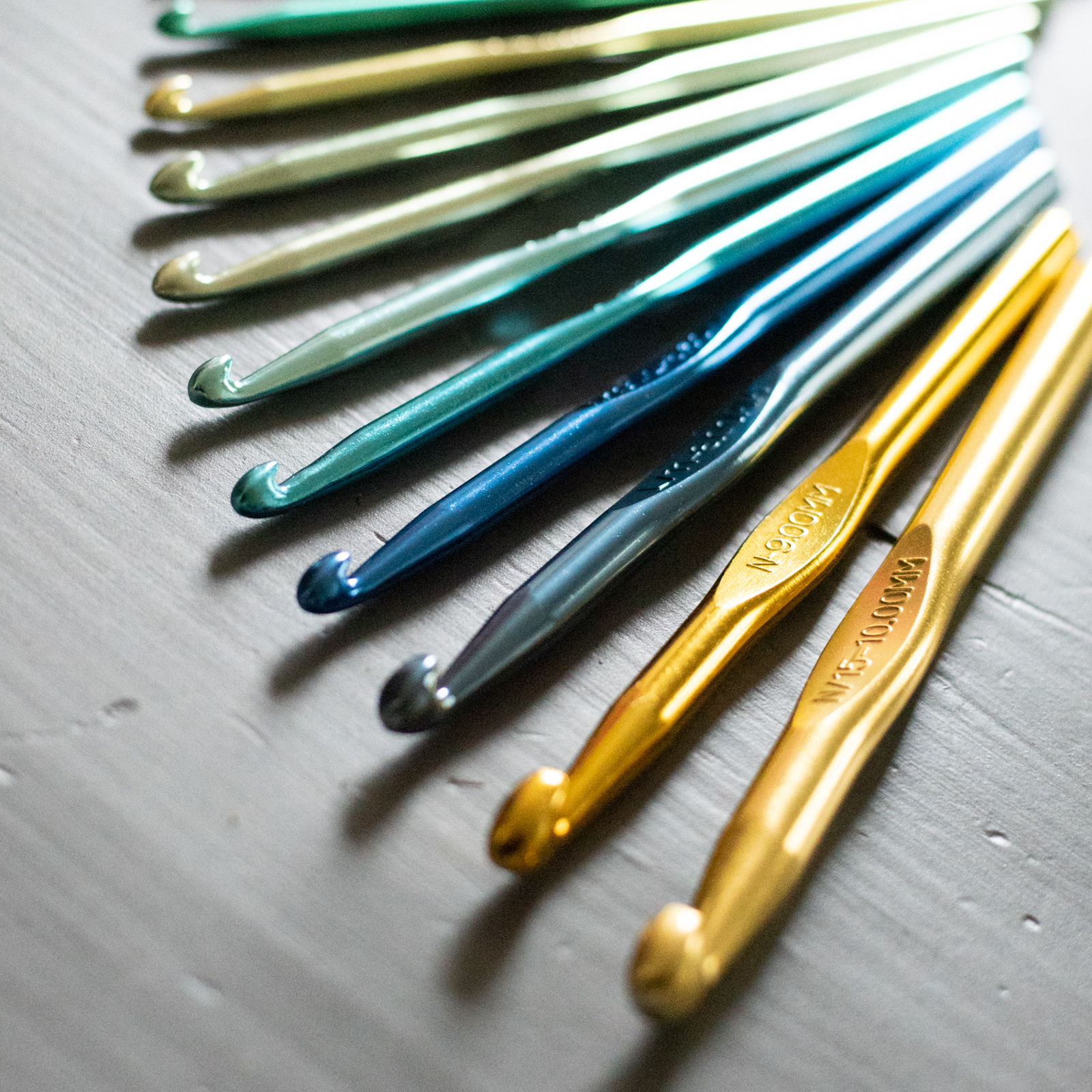 detail of an array of crochet needles, photographed as part of a brand shoot by jamie bannon photography.
